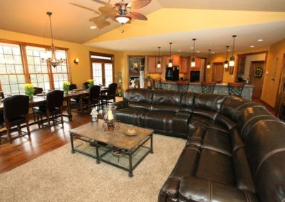 Dining room with leather sectional couch | Hauptman Builders